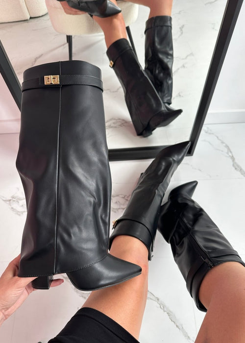 מגפי עור שחורות – אלגנטיות על־זמנית עם נוחות יומיומית