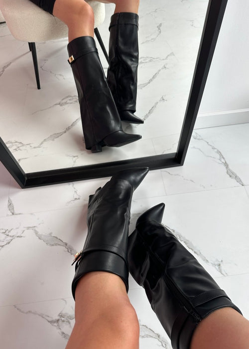 מגפי עור שחורות – אלגנטיות על־זמנית עם נוחות יומיומית