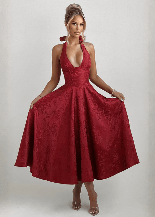 שמלה אלגנטית עם גב פתוח, מחשוף עמוק וקשירה