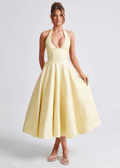 שמלה אלגנטית עם גב פתוח, מחשוף עמוק וקשירה